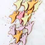 pink, orange, green and purple iced chocolate shortbread cookies