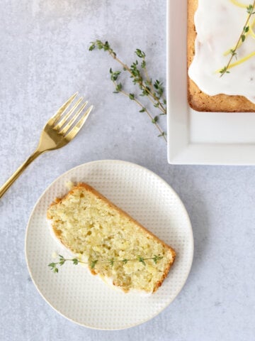 a slice of lemon zucchini bread with a fork