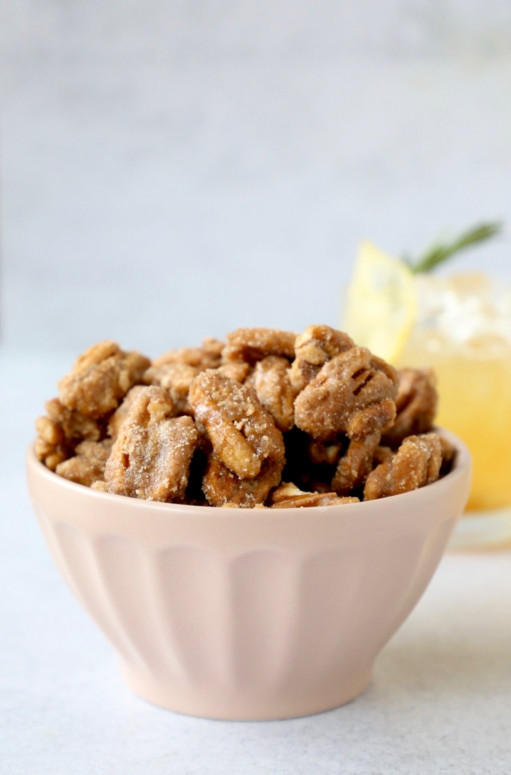a bowl of maple glazed pecans