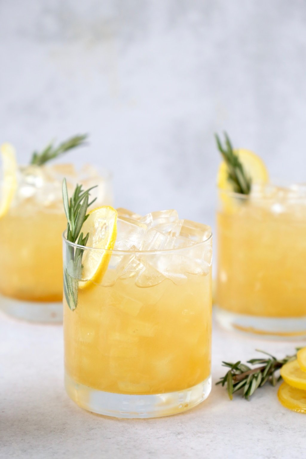 three glasses of Maple Bourbon Sour Cocktail