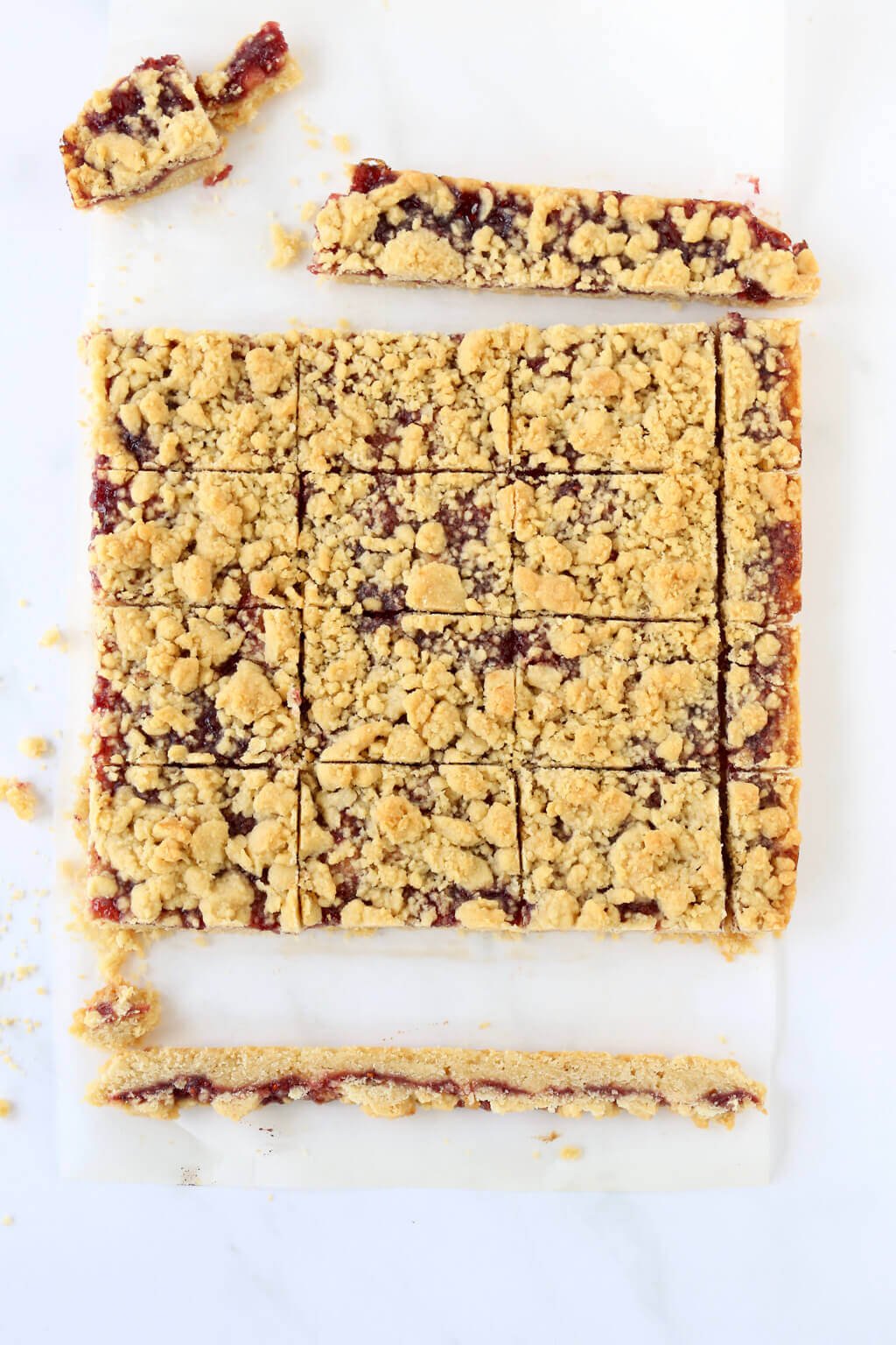 layer of shortbread dough layered with jam and cut into small squares