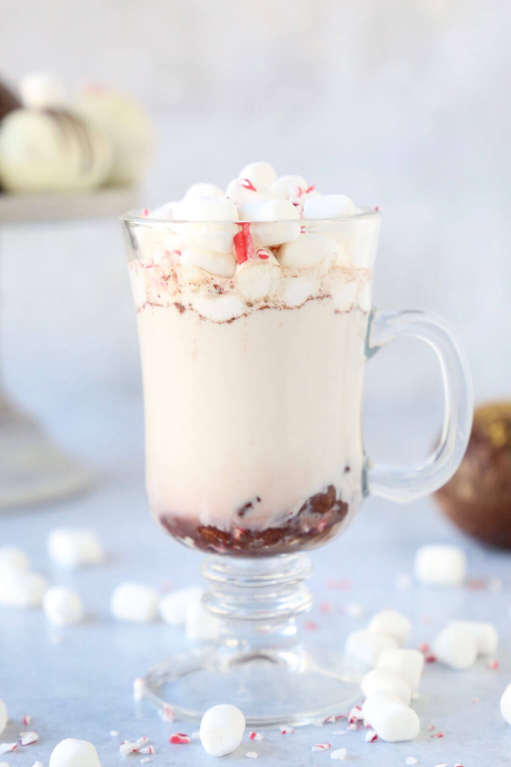 A mug full of hot chocolate topped with marshmallows