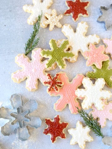 stacked iced snowflake cookies