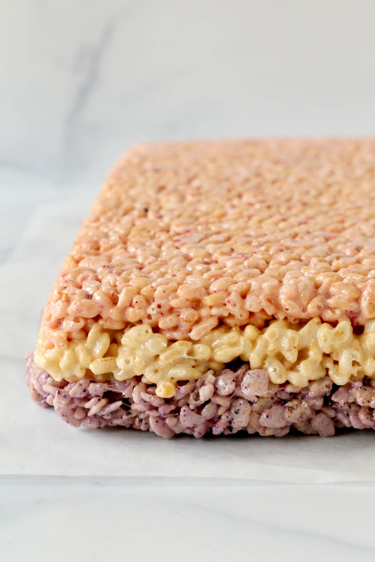 Layers of pink, white and purple rice krispie treats.